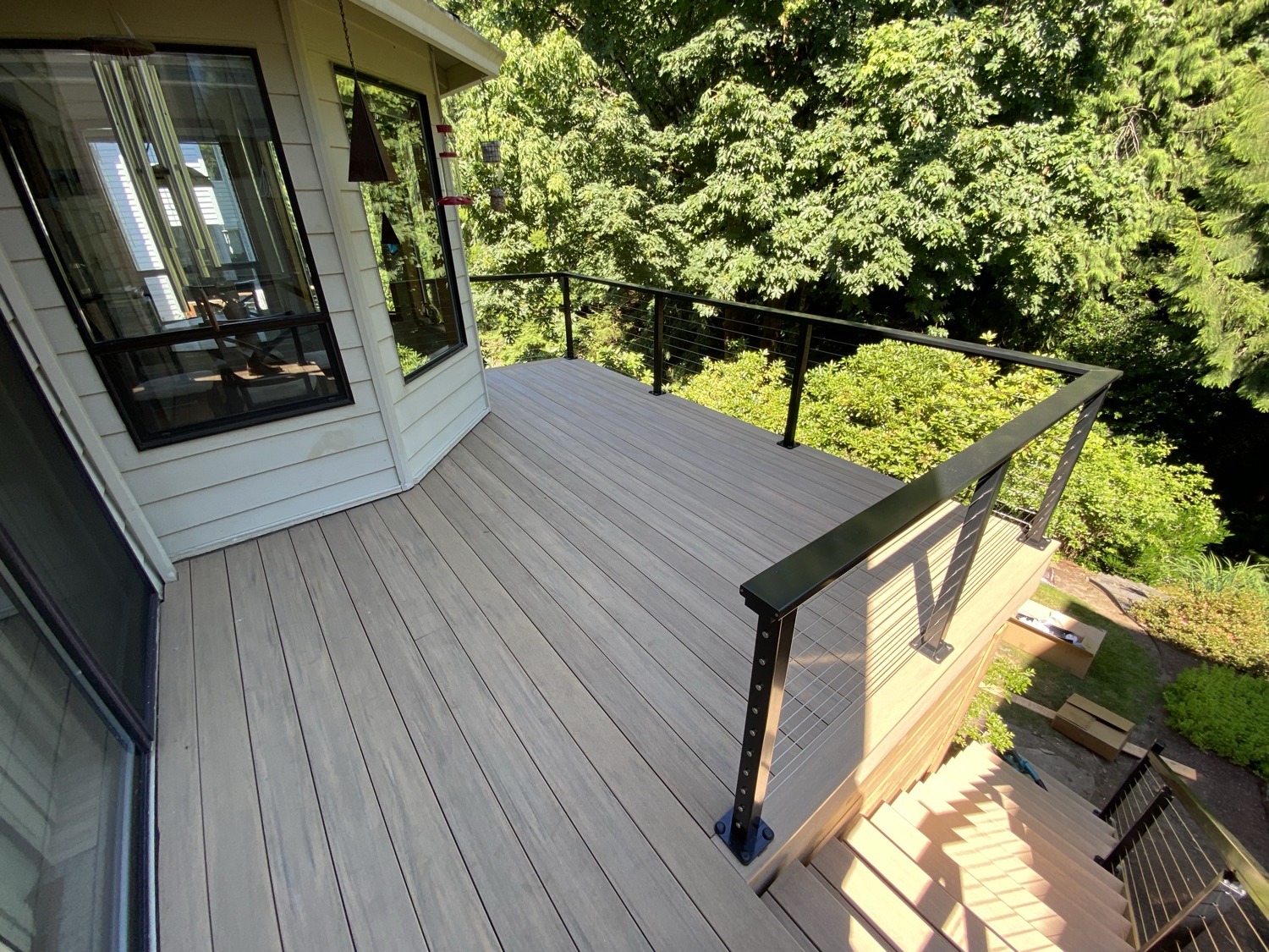 Composite deck with black cable railing