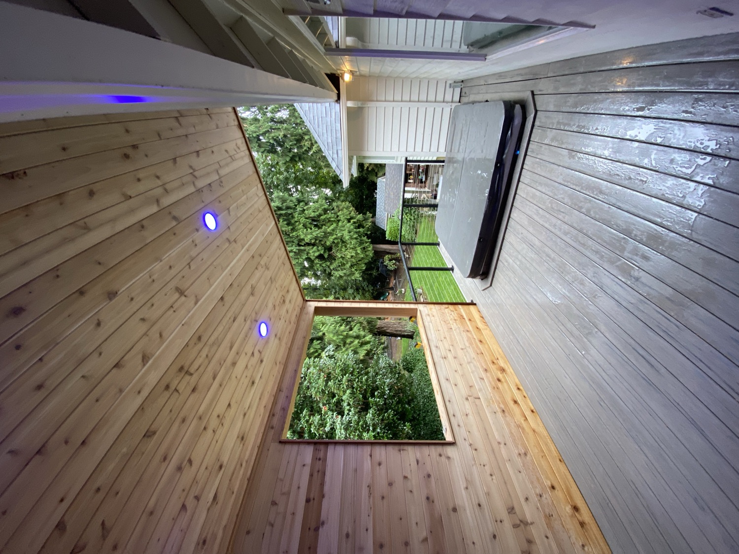 Covered cedar deck with hot tub
